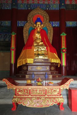 Yi County, China - November 5, 2017: The Buddha statue is worshipped in the Mahavira hall in a temple, Yi County, Hebei Province, China