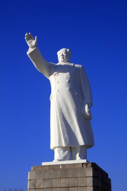 Tangshan - December 5, 2017: Chinese leader MAO zedong's White marble statue in the square, tangshan city, hebei province, China