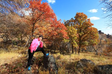 Inner Mongolia, China - October 3, 2017: tourists visit Qingshan Park, Keshiketeng World Geopark, Inner Mongolia, China