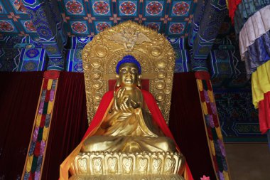 Yi County, China - November 5, 2017: The Buddha statue is worshipped in the Mahavira hall in a temple, Yi County, Hebei Province, China