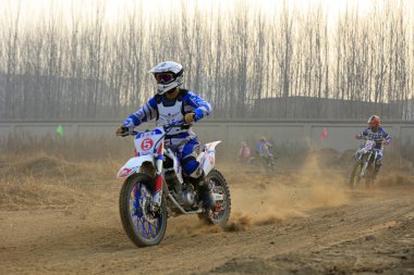 Luannan County - December 2, 2017: Cross-country motorbike field endurance race, Luannan County, Hebei Province, Chin