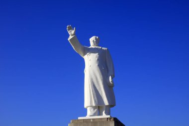 Tangshan - December 5, 2017: Chinese leader MAO zedong's White marble statue in the square, tangshan city, hebei province, China