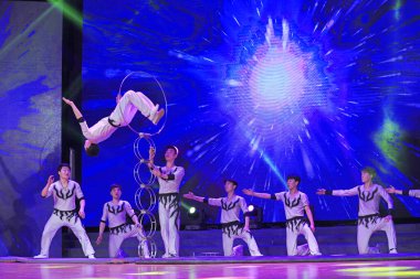 Luannan county - February 9, 2018: drilling ground ring performance on stage, luannan county, hebei province, China