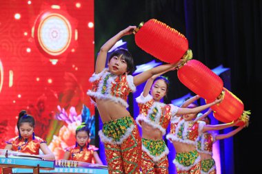 Luannan county - Feb. 9, 2018: lantern dance performance on stage, luannan county, hebei province, China