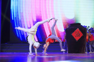 Luannan county - February 9, 2018: children dance performance on stage, luannan county, hebei province, China