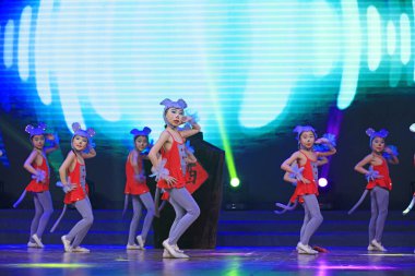 Luannan county - February 9, 2018: children dance performance on stage, luannan county, hebei province, China