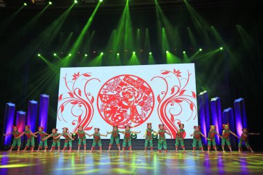 Luannan county - February 9, 2018: children dance performance on stage, luannan county, hebei province, China