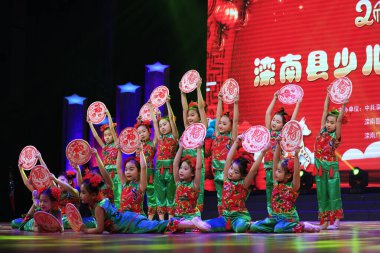 Luannan county - February 9, 2018: children dance performance on stage, luannan county, hebei province, China