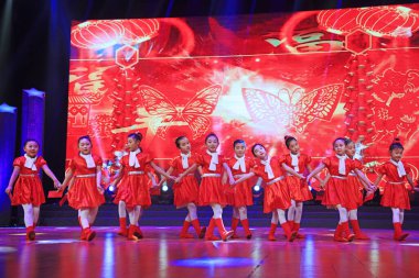 Luannan county - February 9, 2018: children dance performance on stage, luannan county, hebei province, China