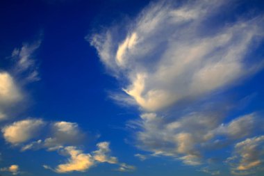 blue sky and white clouds, closeup of photo 