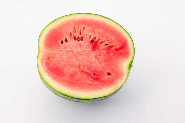 Watermelon profile in a white background, closeup of photo