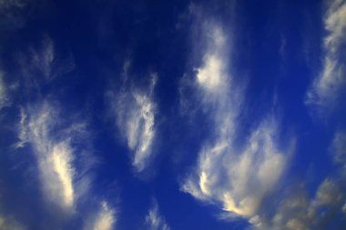 blue sky and white clouds, closeup of photo 