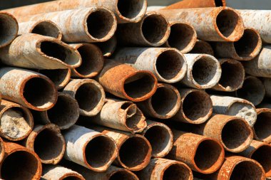 Rust deformation steel pipe in the construction sit clipart