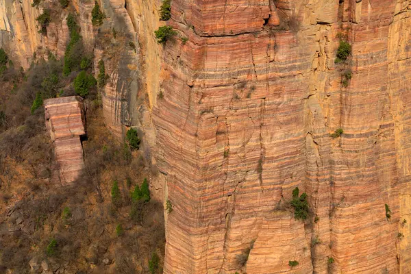 Stock image Sheer precipice and overhanging rocks rock texture