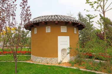 Çin 'deki Fujian toprak binasının küçülmüş manzarası.