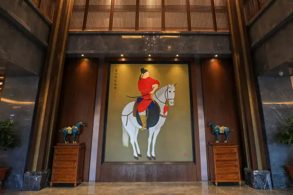 stock image Tangshan, China - December 16, 2021:The art works of ancient Chinese generals riding horses are in a hotel lobby, North China