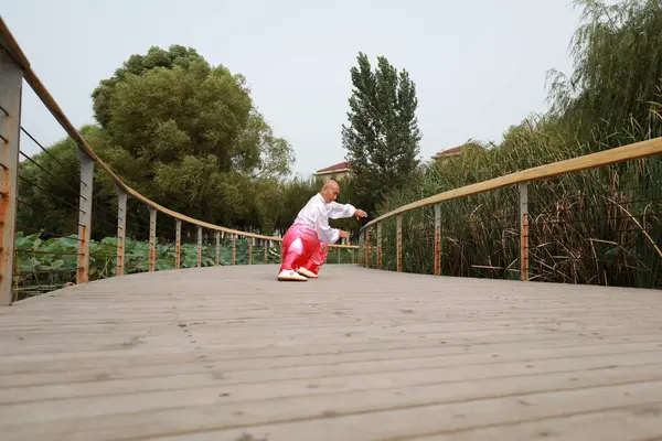 stock image LUANNAN COUNTY, China - September 12, 2021: people practice Taijiquan in the park, North China