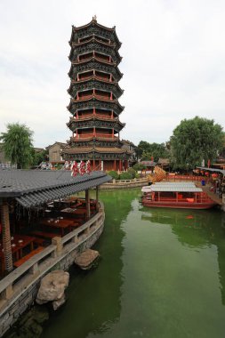 The pagoda with traditional Chinese style is in a tourist area, North China clipart