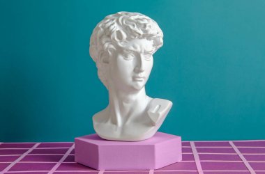 David antique statue on the podium in the digital space in the metaverse as a concept of digital art and business of the future. High quality photo