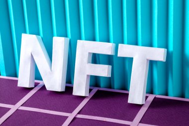 NFT 3D letter designation token technology blockchain cryptocurrency and business online and virtual. High quality photo
