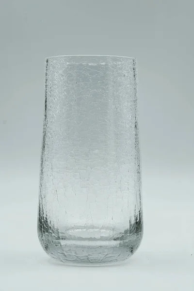 cracked-looking glass of water