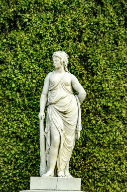 Vienna, Austria, September 26 2022. This is one of the park marble sculptures that adorns the alleys of Schonbrunn Palace Park