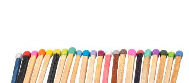 matchsticks various colors on white background
