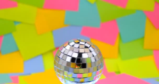 Globe Mirrors Spinning Colorful Sticky Notes Background — Stockvideo