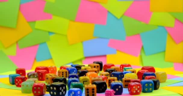 Colourful Dices Rotating Table Multicolored Paper Sticky Notes Background — Stockvideo