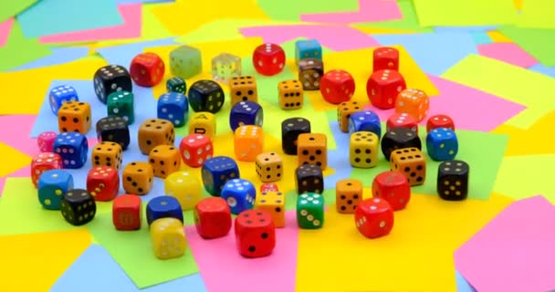 Colourful Dices Rotating Table Multicolored Paper Sticky Notes Background — Video Stock