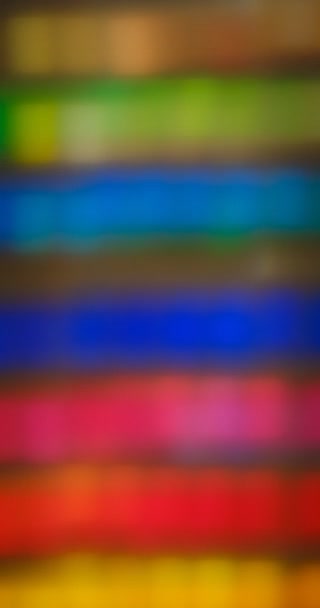 多色の抽象的なぼやけたボケの背景 フルフレーム垂直 — ストック動画