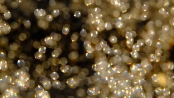 Goldener Glitzerhintergrund Zeitlupe Schöner Übergang Mit Echten Goldpartikeln Wind Auf — Stockvideo