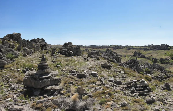 stock image wild landscapes with rocks and grass