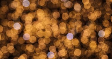 Noel ışıkları arka planda odaklanmamış. Bulanık peri ışıkları. Odaklanma dışı tatil geçmişi. 