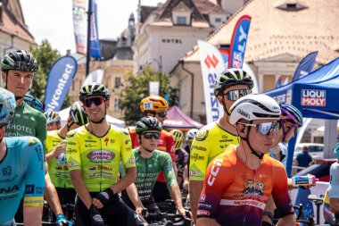 Sibiu City, Romania - 09 July 2024. cyclists before the start of Stage 4 of the Sibiu Ciclyng Tour 2024 clipart