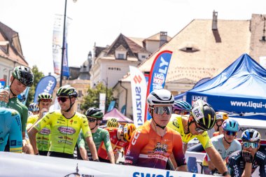 Sibiu City, Romania - 09 July 2024. cyclists before the start of Stage 4 of the Sibiu Ciclyng Tour 2024 clipart