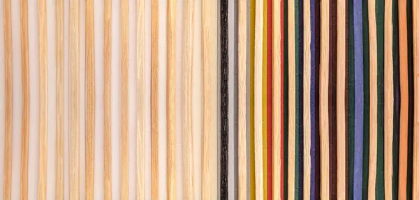 stock image multicolored matchsticks on multicolored paper