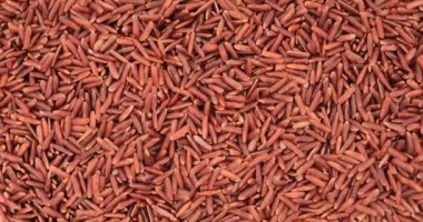 Pişmemiş kırmızı pirinç duvar kağıdı. Kapat.. 