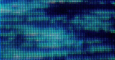 4K LED matris kırmızı, mavi ve yeşil alt piksellerin ekstrem makro görünümü, monitör veya TV ekranı. Renkli piksel dokusu soyut bir kalıp oluşturur.