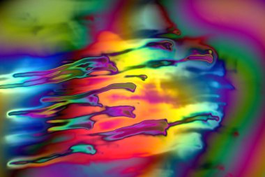 Hareket halindeki spektral renklerin soyut fraktal patlaması, yaratıcılık ve hayal gücü.