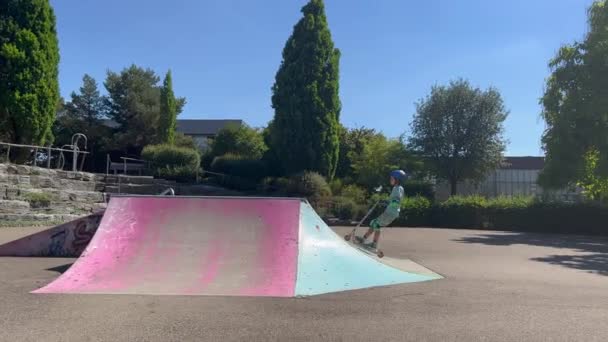 Boy Protective Gear Riding Push Scooter Skateboard Park — Vídeo de Stock