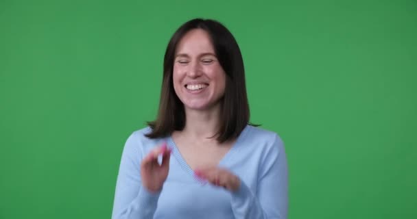 Caucasian Woman Standing Green Background Looking Camera Big Smile Suddenly — Stock Video