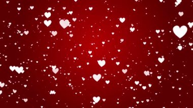 Dönen beyaz kalpler zarif bir şekilde canlı kırmızı bir zemine doğru uçuyor havada süzülüyor, neşe ve büyüyü çağrıştırıyor. Şefkat ve şefkat örneği oluşturuyor..