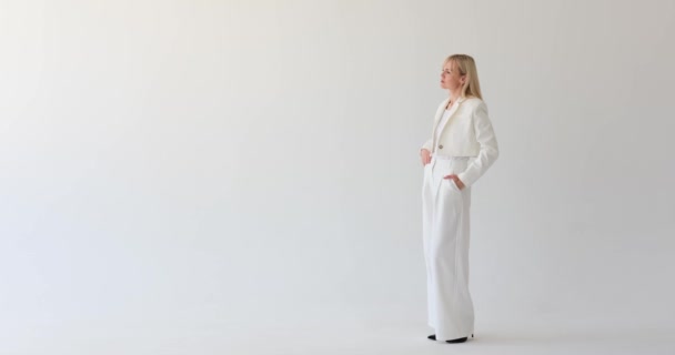 Assured Self Assured Woman Stands Confidently Clean White Backdrop Her — Stock Video
