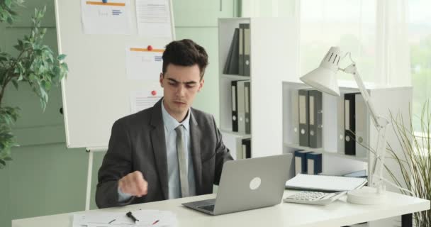 Young Office Worker Diligently Managing Tasks Professional Office Setting Seated — Stock Video
