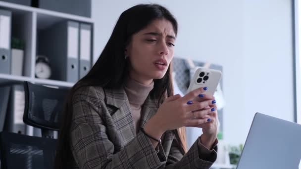 Depressed Caucasian Woman Office Worker Using Phone Receiving Bad News — Stock Video
