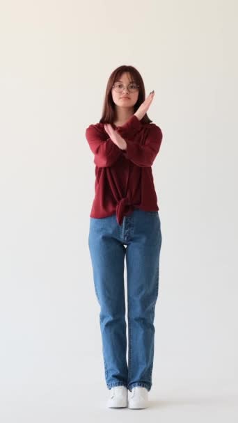 Stern Girl Showing Stop Gesture Crossed Arms Rejection White Background — Stock Video