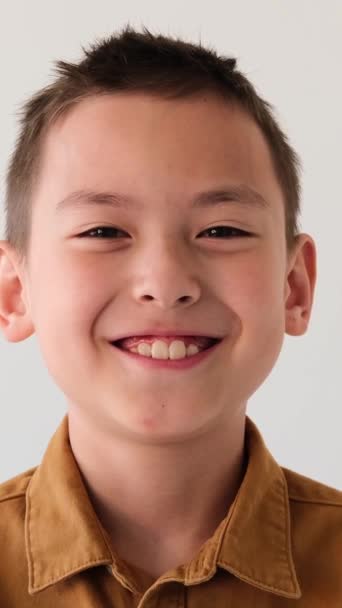 Close Portrait Smiling Happy Friendly Young Asian Boy Looking Camera — Stock Video