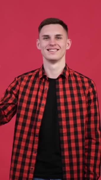 Friendly Caucasian Young Man Showing Sign Approve Confirm Red Background — Vídeos de Stock