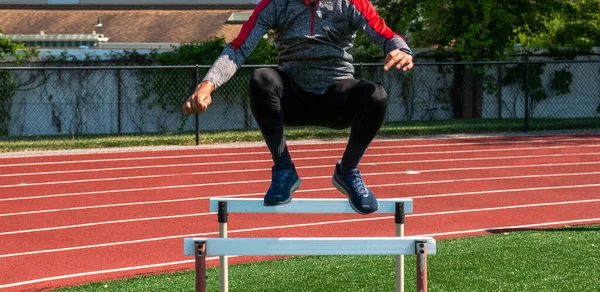 Front View High School Boy Jumping Track Hurdles Track Field — Stock Photo, Image